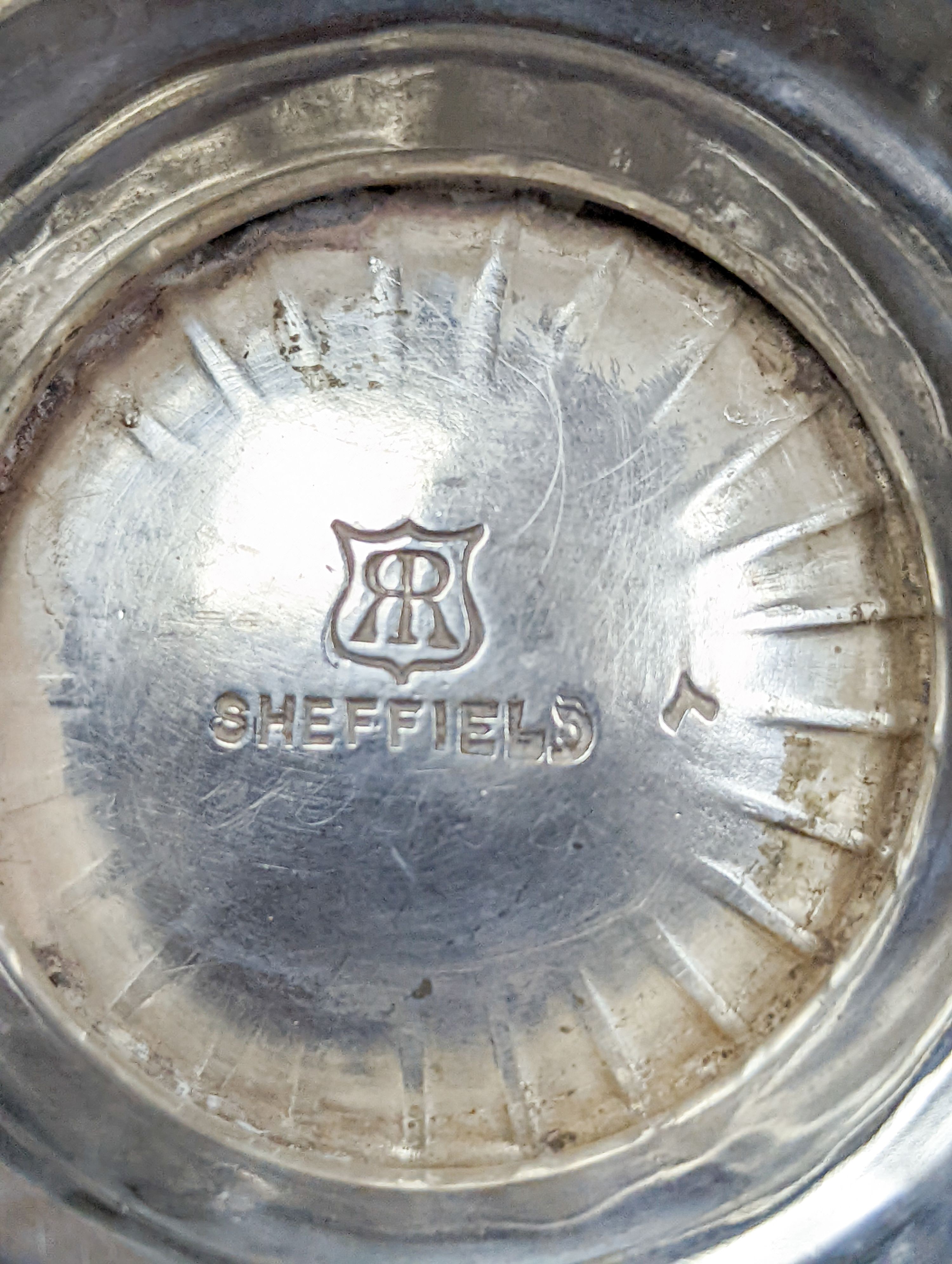 An Edwardian silver bowl, Sheffield, 1904, diameter 11.7cm, five assorted small silver bonbon dishes, a small silver pot and a small silver sauceboat, 12.5oz.